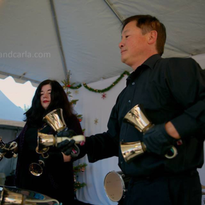 Handbell duo Larry and Carla perform at the GISSV German Holiday Market in Mountain View, California