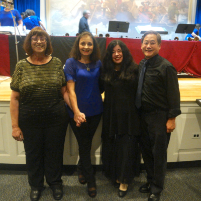 Handbell duo Larry and Carla with Susan T. Nelson and Inna Lai after the final concert of the tour