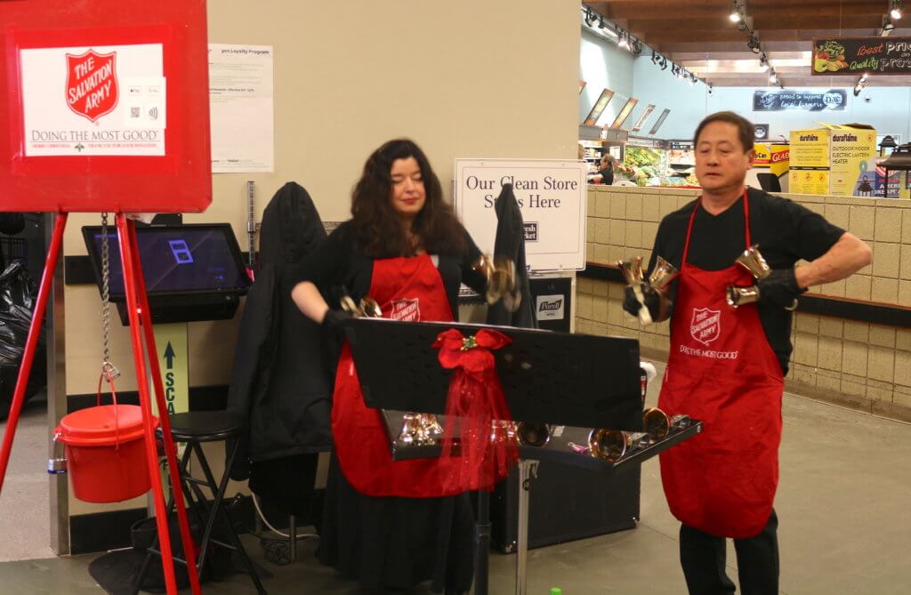 Salvation Army bell ringers with handbells