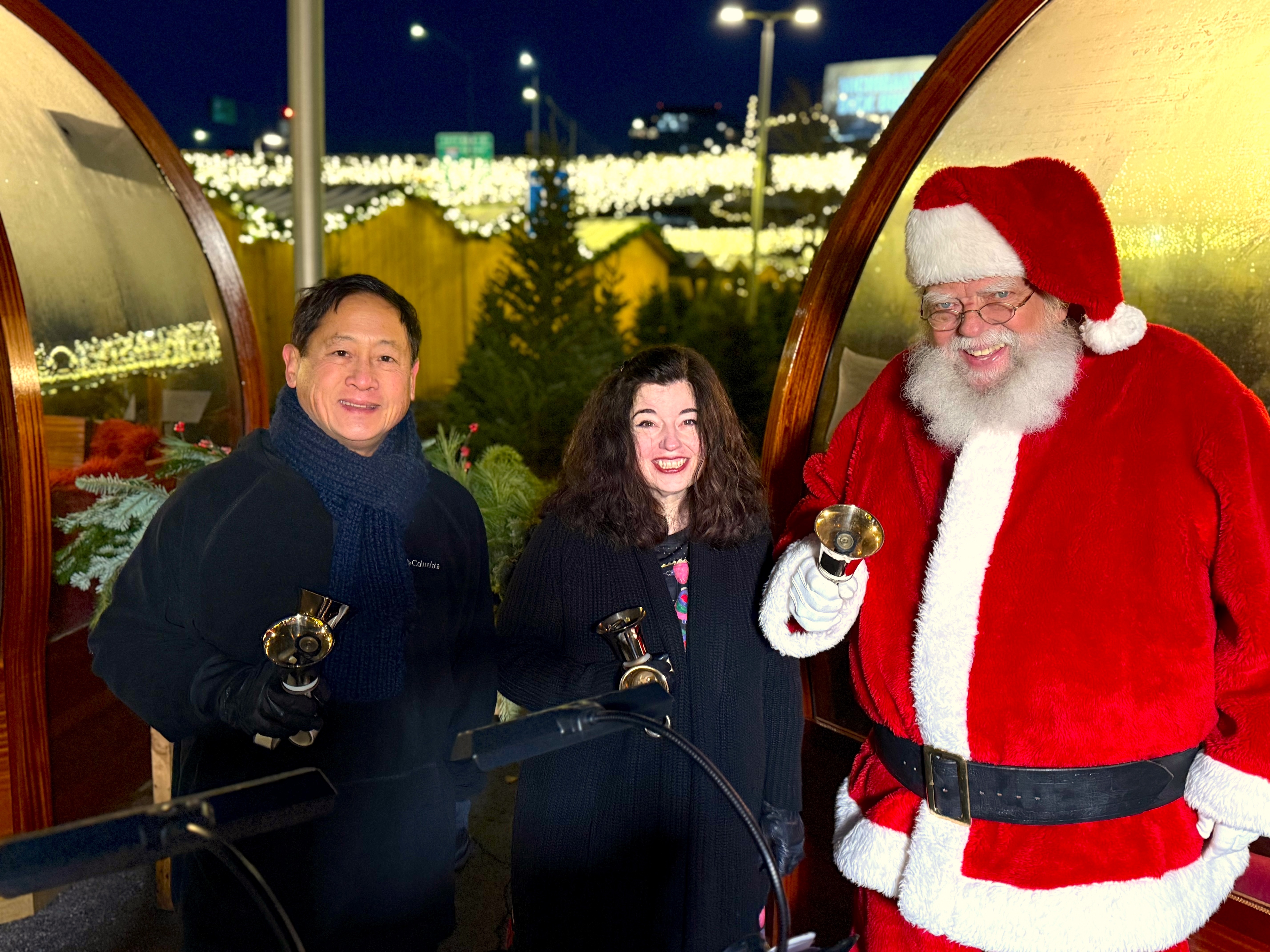 handbell ringers with Santa at Christkindl Markt Grand Rapids